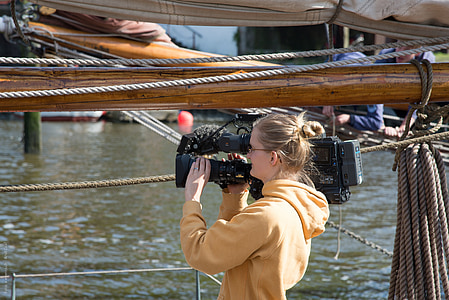reporter, journalist, film team, cinematographer, camera woman, tv, film