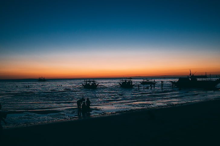 beach, boats, ocean, people, sea, shore, silhouette