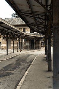 old railway station, bus station, buses, sidewalk, stop