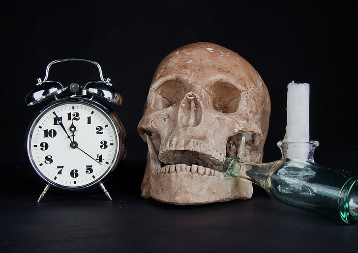 clock, alarm clock, time, skull, candle, a bottle of, glass