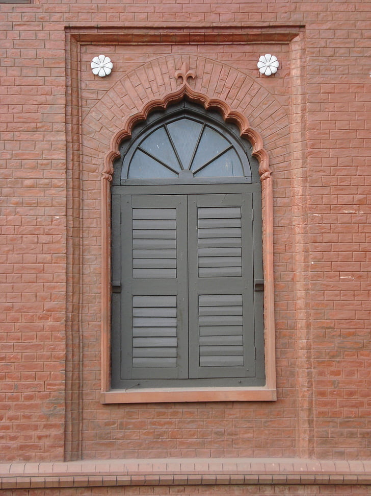 front of curzon hall's window, british raj-era building, dhaka