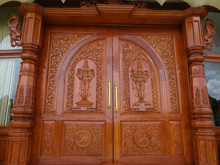 ornate door, wooden, carved, art of living, international center, yoga, spirituality