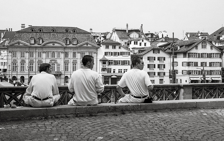 men, sitting, waiting, wall, urban, city, walkway
