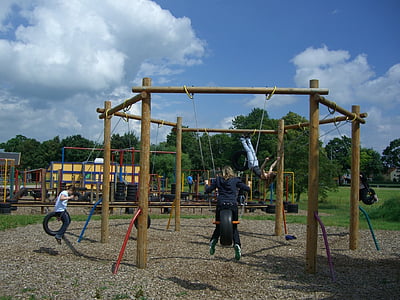 children's playground, langenau, fun arena, tire swing, sky blue, clouds, playground