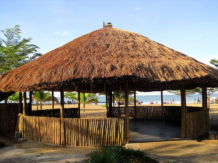 africa, thatch roof, lapa, entertainment area, reed walls, lake in background
