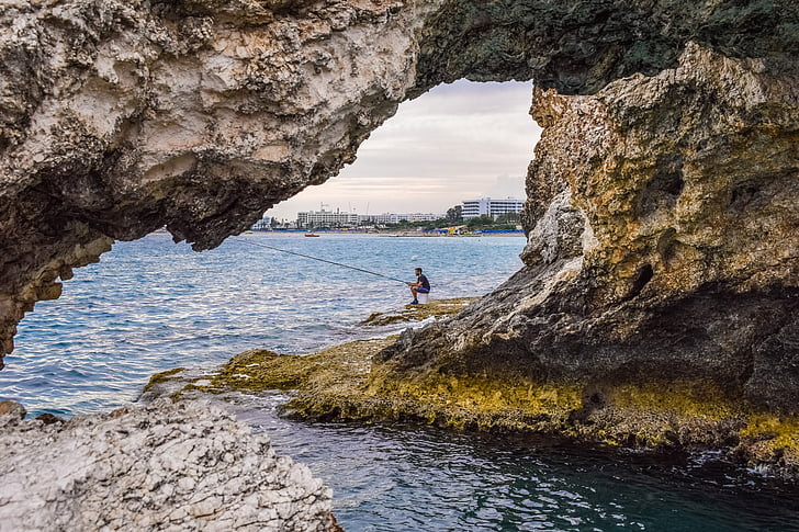 sea caves, rock, erosion, geology, formation, scenery, fisherman