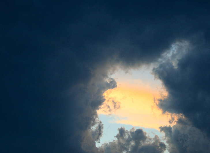 clouds, dark, ominous, opening, sunset, showing, orange-yellow