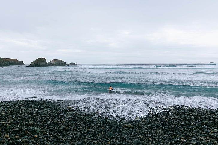 person, standing, seashore, waves, rocks, beach, ocean