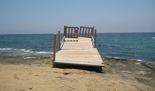 spain, jetty to nowhere, no entry, tilting, bent, sea, sand