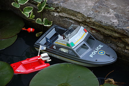 boot, toys, plastic boat, garden pond, leaves, water, water lily