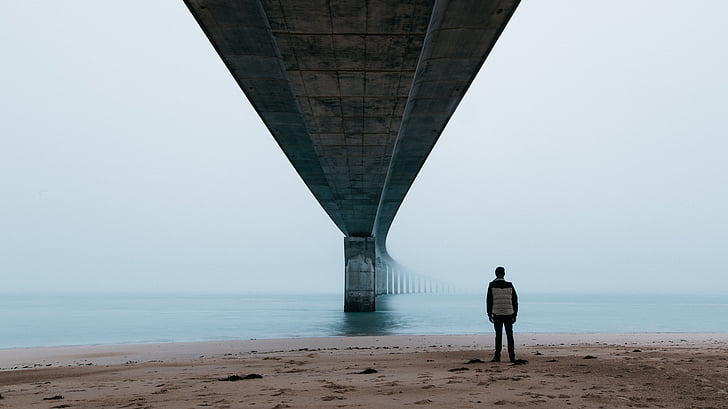 man, standing, brown, sand, bridge, sea, dark