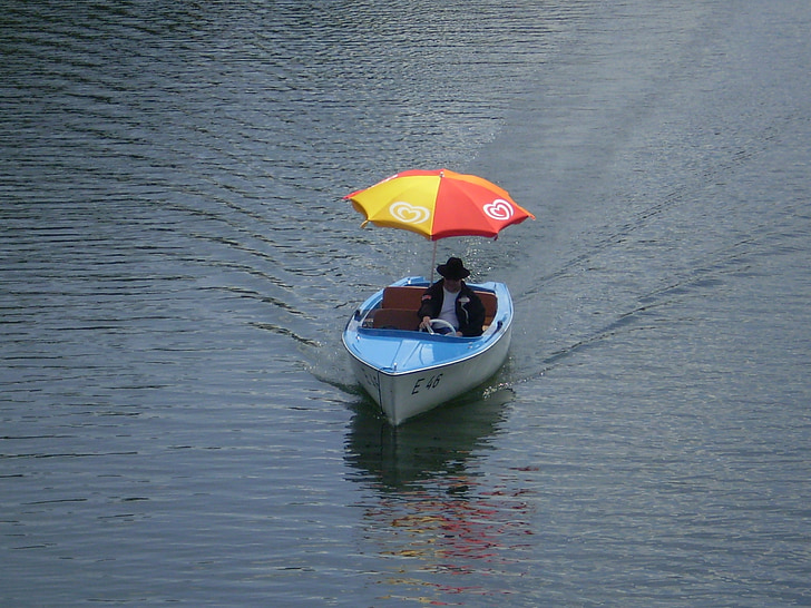 pedal boat, parasol, river