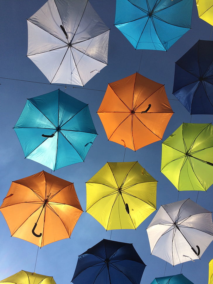 colorful umbrellas, suspended in the air, blue, orange, yellow, multi colored, composition