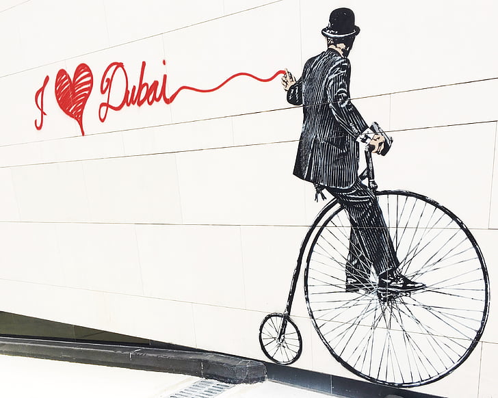 dubai, city walk, graffiti, bicycle, transportation, cycling, text