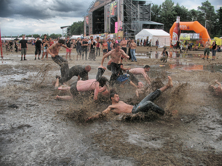 mud, rain, puddle, dirty, fun muddy, people playing, music festival