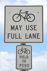 bike lane, sign, outdoors, signage, bicycle, road, transportation