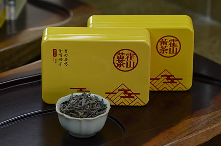 tè giallo, tè, scatola di ferro