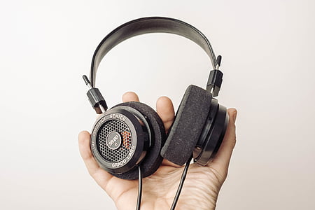 person, holding, black, headphones, hand, technology, earphone