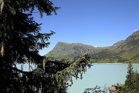 hegyi panorámával, Tirol, tó, fák, nézet