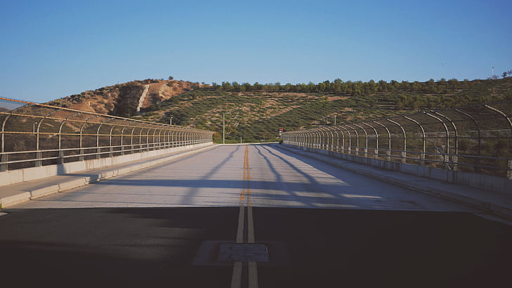 empty, concrete, road, near, green, mountains, overpass bridge