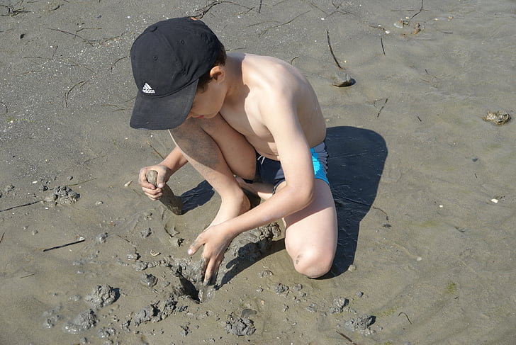 boy, play, sand, digging, dig, swim, swimming trunks