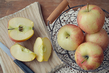 apple, bio apple, fruit basket, basket, wooden board, cutting board, cut