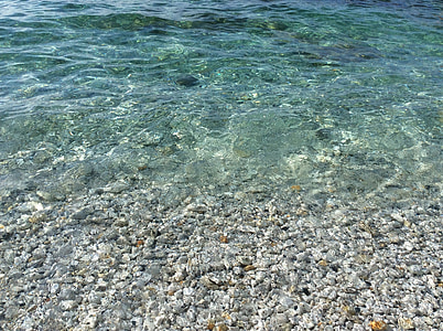 zee, transparant, steentjes