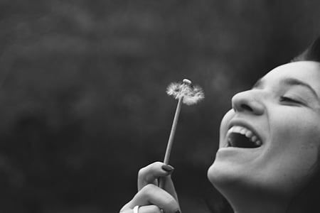 adult, black-and-white, close-up, dandelion, face, facial expression, girl