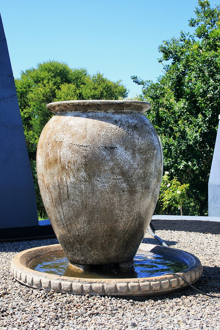 urn, large, earthy color, light, water, walls
