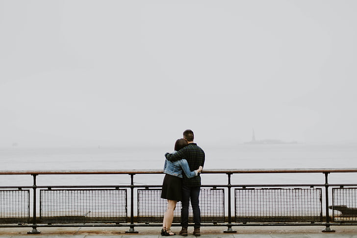 couple, embracing, standing, looking, foggy, body, water