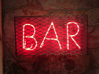 lit, bar, neon, signage, behind, stainless, steel