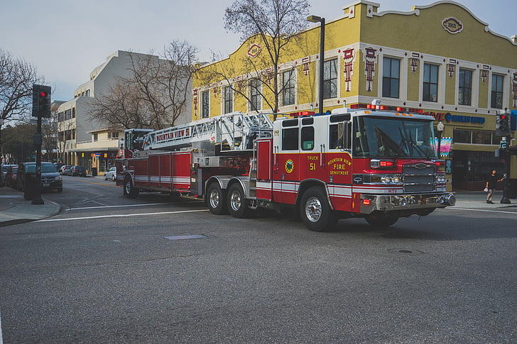 red, fire truck, emergency, intersection, street, road, city