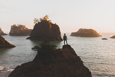 silhouette, man, standing, rock, formation, watching, islands