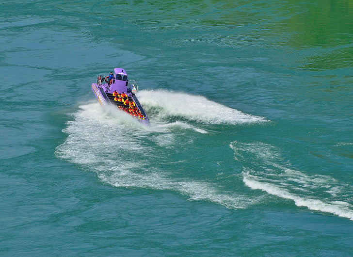 purple jet boat, spinning, waves, niagara river, thrilling action