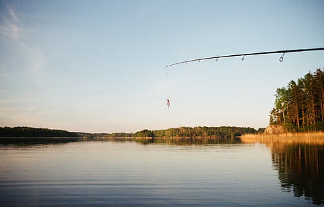 person, taking, photo, black, fishing, rod, orange