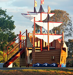 pirate ship, park, blue sky, yellow, white sails, ship's hull