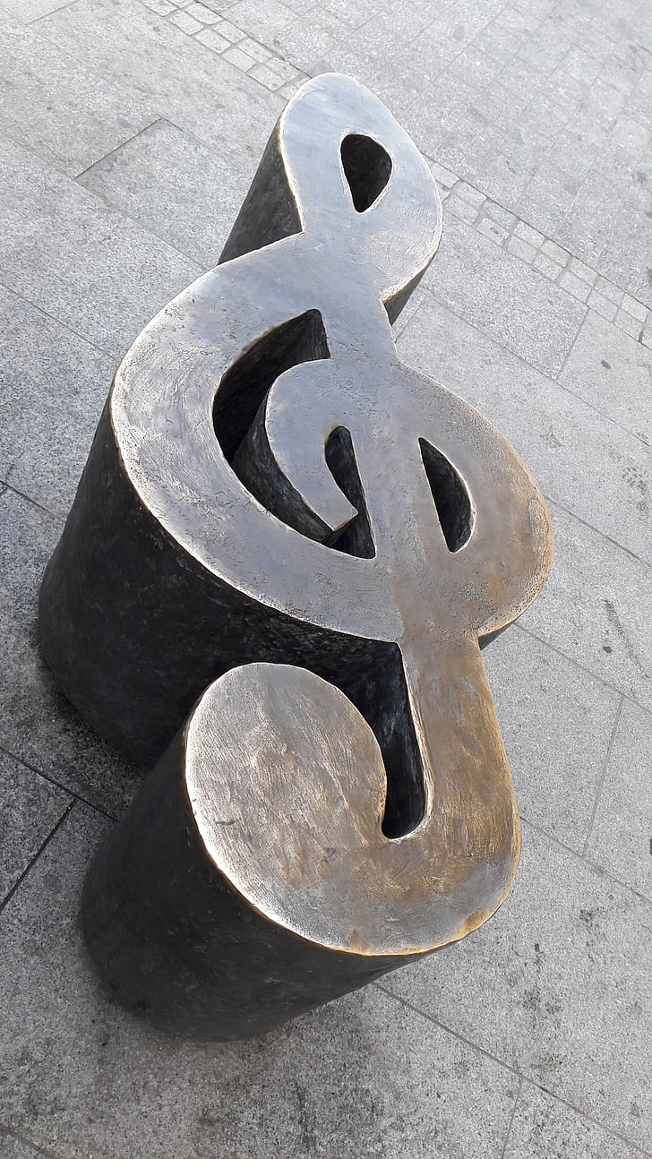 music, sculpture, music theme, clef, sidewalk, chairs, metal