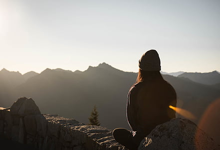 person, sitting, rock, sunrise, mountain, woman, horizon