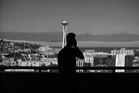 black-and-white, buildings, city, cityscape, man, seattle, silhouette