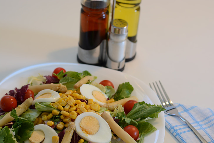 salad, corn, lettuce, asparagus, oil, tomato, egg