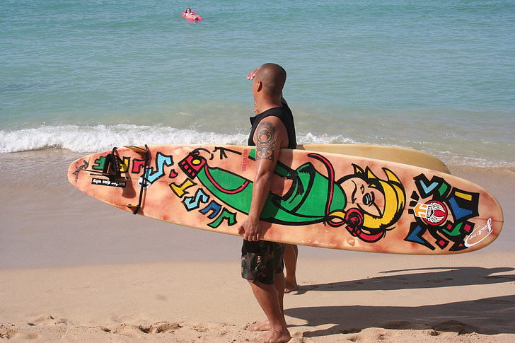 Surfer, geschilderde surfplank, Hawaii, Oahu, Honolulu, Waikiki beach