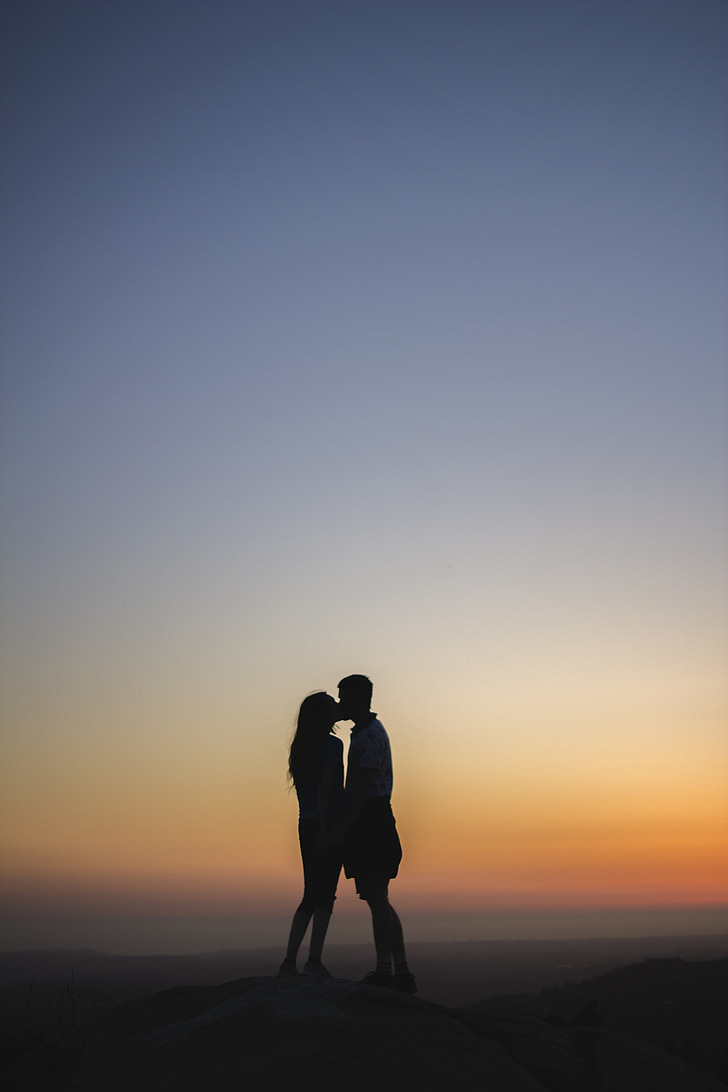 couple, kissing, love, romance, holding hands, sunset, dusk