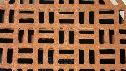 stainless, manhole cover, squares, rectangles, rusty red, metal, pattern