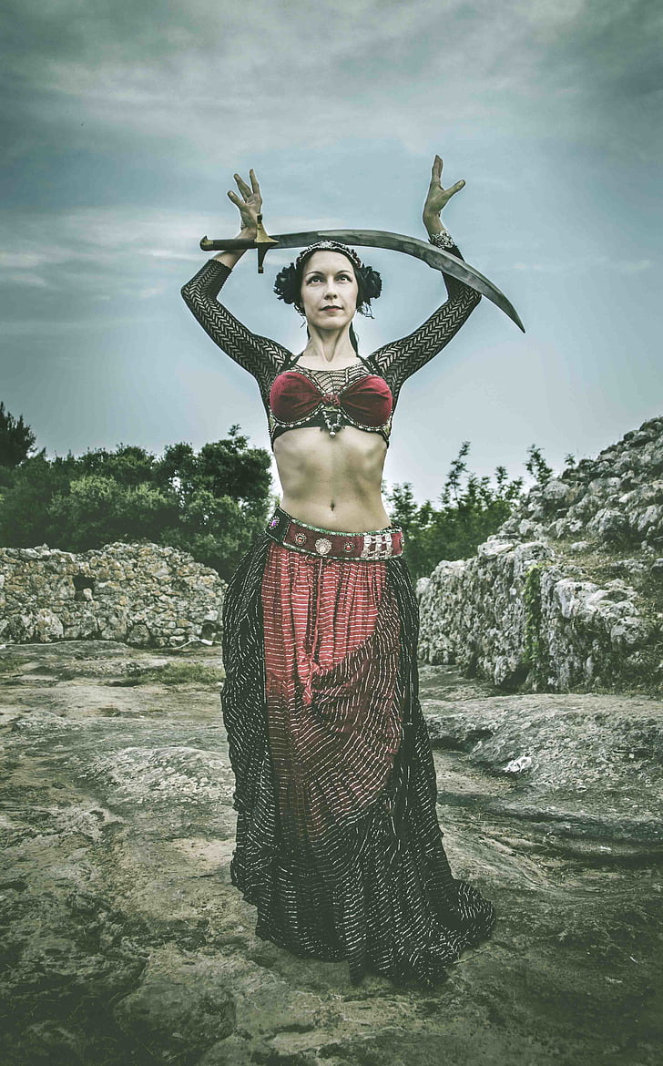 model, outdoors, person, sword, woman