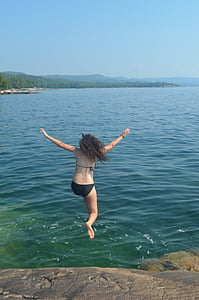 girl jumping into water, swimming, rock jump, recreation, outdoor, summer, lake