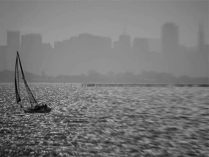 grayscale, photography, sailboat, body, water, skyline, fog