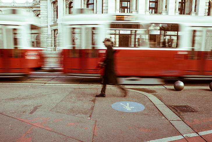 street, tram, man, walking, city, urban, europe