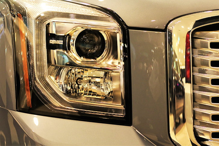 automobile, cars, headlight, indoors, no people, close-up, day