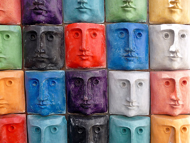 faces, colors, masks, heads, wall