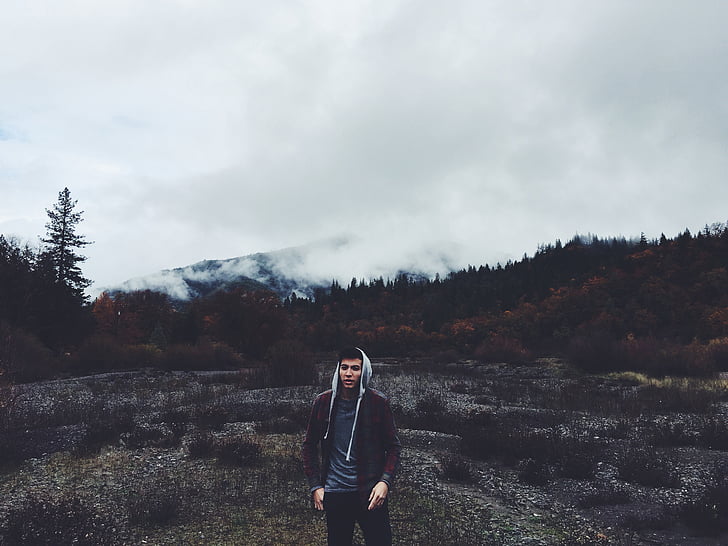 guy, hoodie, mountains, forest, trees, nature, clouds